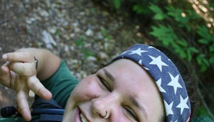 Corpsmember Brittany Weinstein, spreading peace in the Michigan woods.