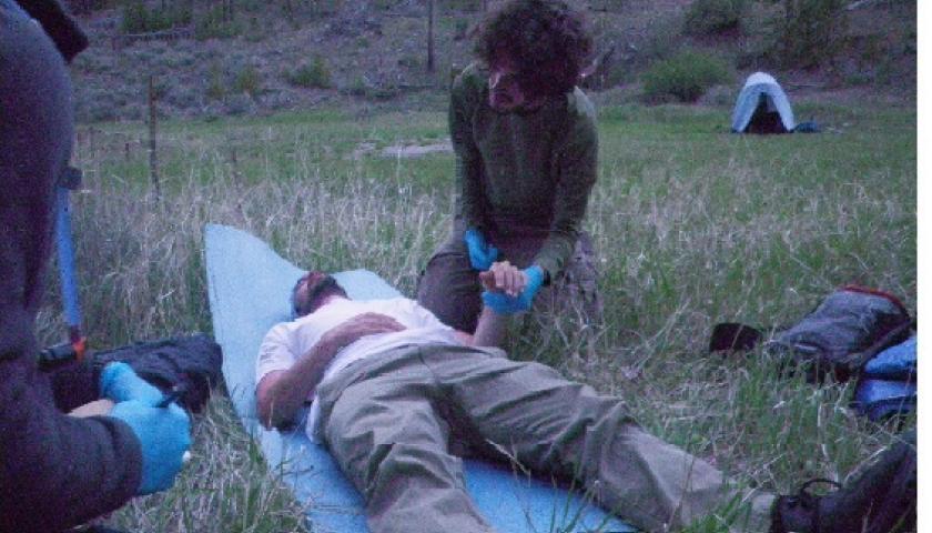 Asher Hudson, SCA Idaho, tending to a patient during a mock scenario.
